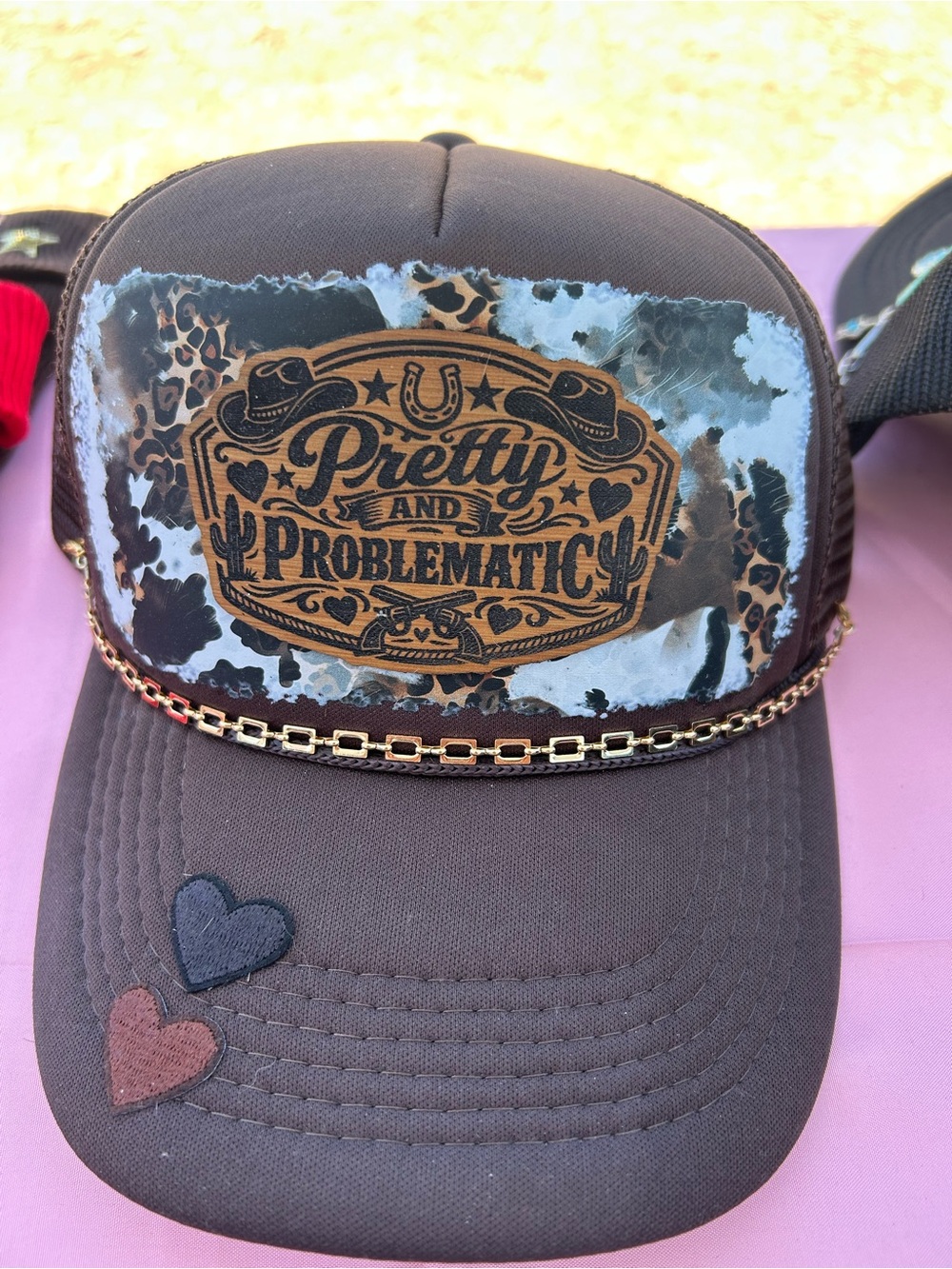 Pretty and Problematic Brown Trucker Hat